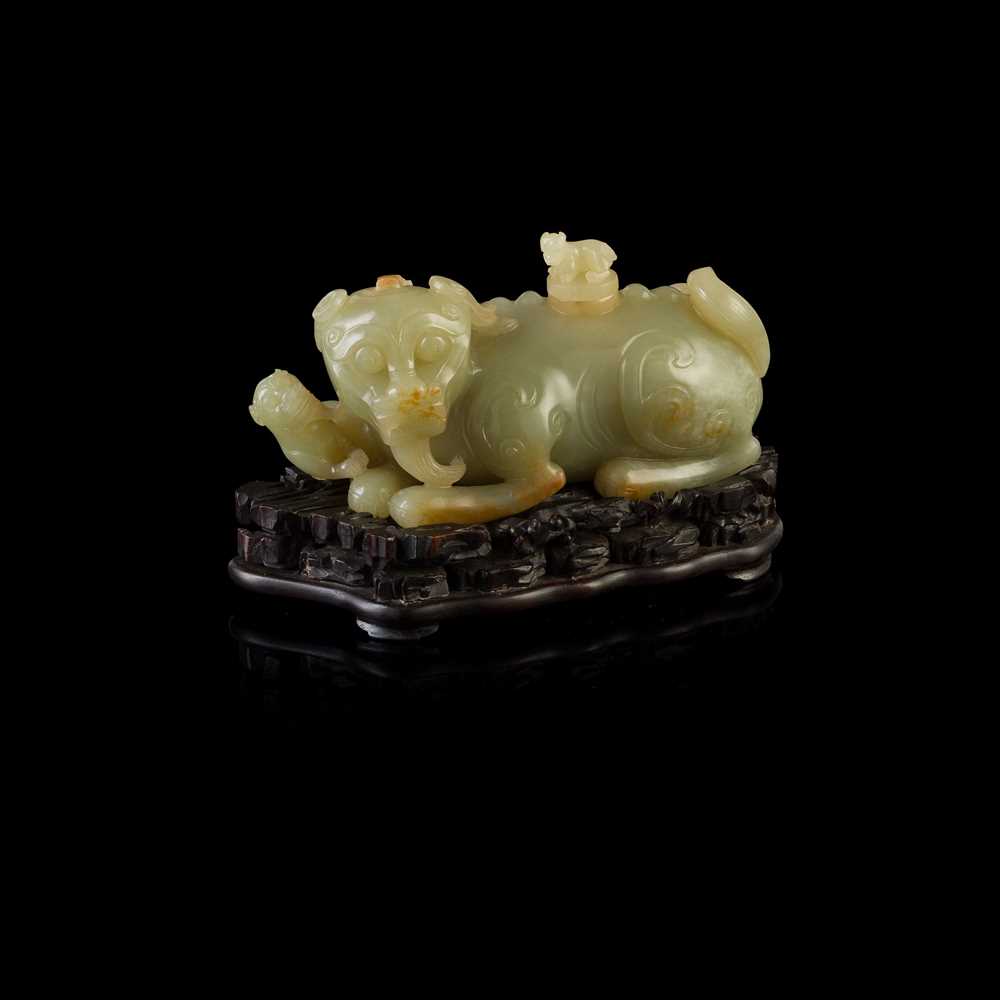 Lot 109 - CELADON JADE 'QILING WITH CUBS' WATER DROPPER