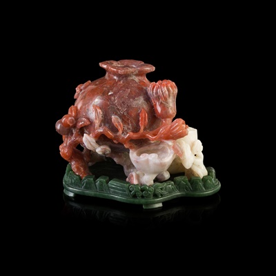 Lot 115 - CARNELIAN CARVING OF A POMEGRANATE