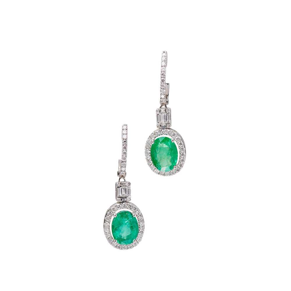 Lot 69 - A pair of emerald and diamond set pendant earrings