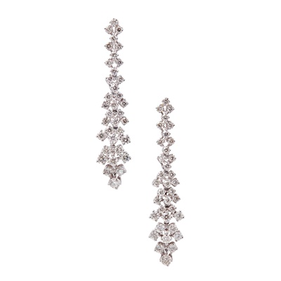 Lot 77 - A pair of diamond set pendant earrings