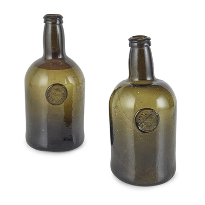 Lot 173 - TWO ENGLISH APPLIED SEAL BLACK GLASS WINE BOTTLES