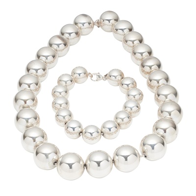 Lot 128 - A silver bead necklace and bracelet, Tiffany & Co.
