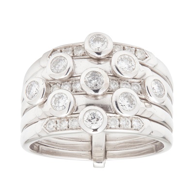 Lot 130 - A white gold and diamond set stacking ring