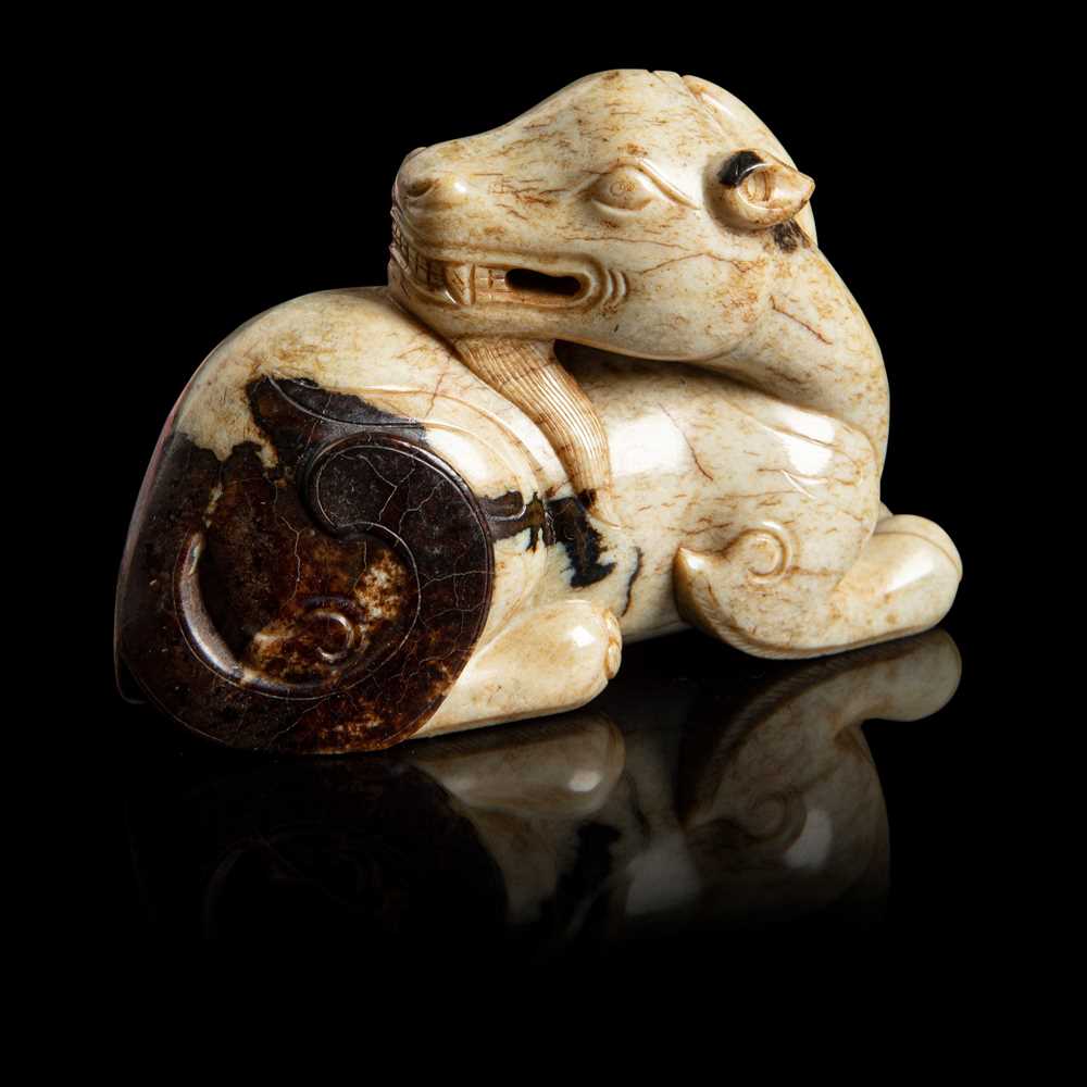 Lot 73 - 'CHICKEN BONE' JADE CARVING OF A GOAT