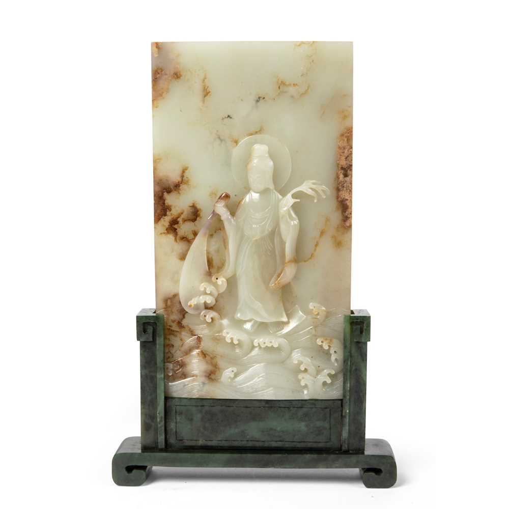 Lot 102 - PALE CELADON JADE CARVING OF GUANYIN TABLE SCREEN