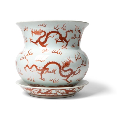 Lot 135 - IRON-RED DECORATED 'DRAGON' JARDINIÈRE WITH PLATE