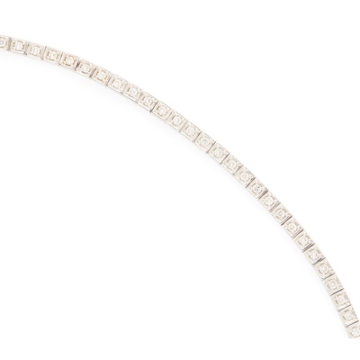 Lot 71 - A 18ct white gold diamond set line bracelet