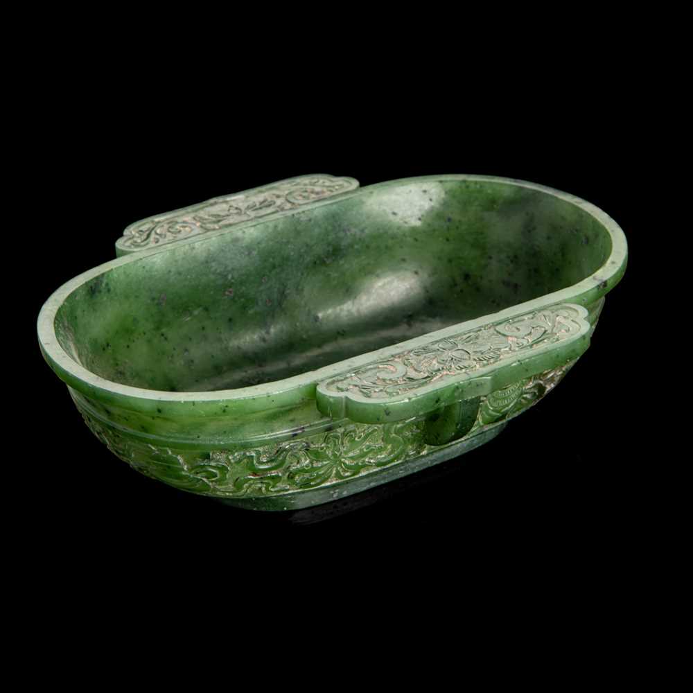 Lot 74 - SPINACH CELADON JADE EAR CUP