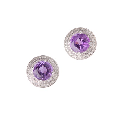 Lot 34 - A pair of amethyst and diamond set earrings