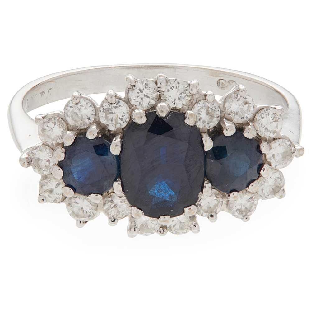 Lot 83 - A sapphire and diamond set cluster ring
