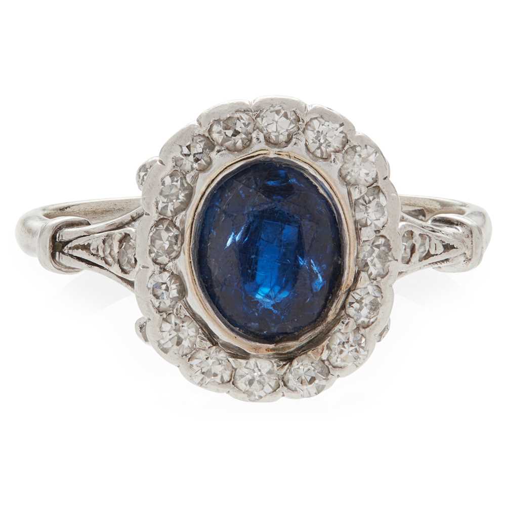Lot 14 - A sapphire and diamond set cluster ring