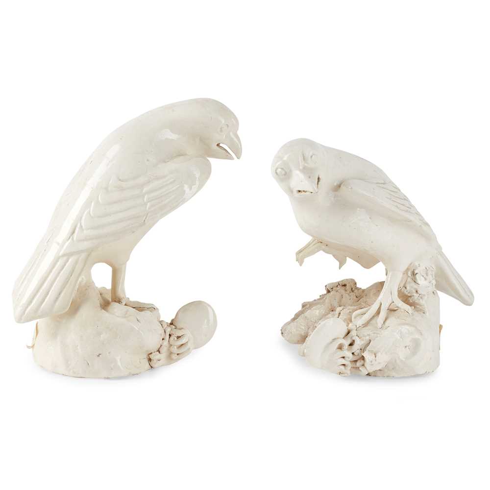 Lot 121 - PAIR OF CONTINENTAL WHITE GLAZED POTTERY SEA HAWKS