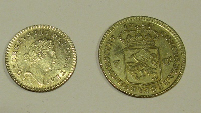 Lot 99 - G.B. - A George III 1/3 Guinea and Holland, a seven Gulden coin