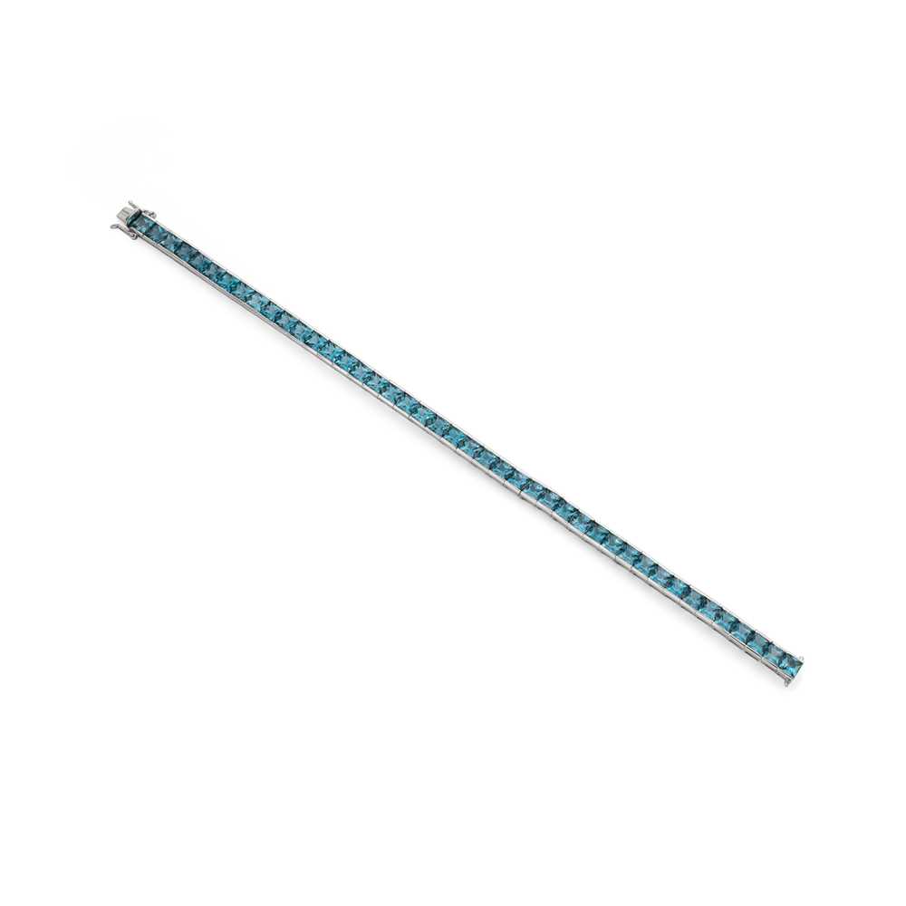 Lot 103 - A blue topaz line bracelet, by H. Stern