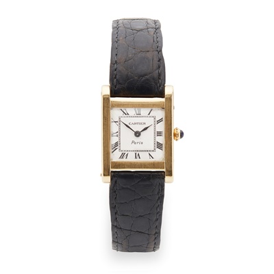 Lot 141 - Cartier: a gold wrist watch