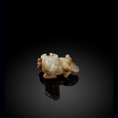 Lot 129 - WHITE JADE WITH RUSSET SKIN CARVING OF A BUFFALO WITH BOYS