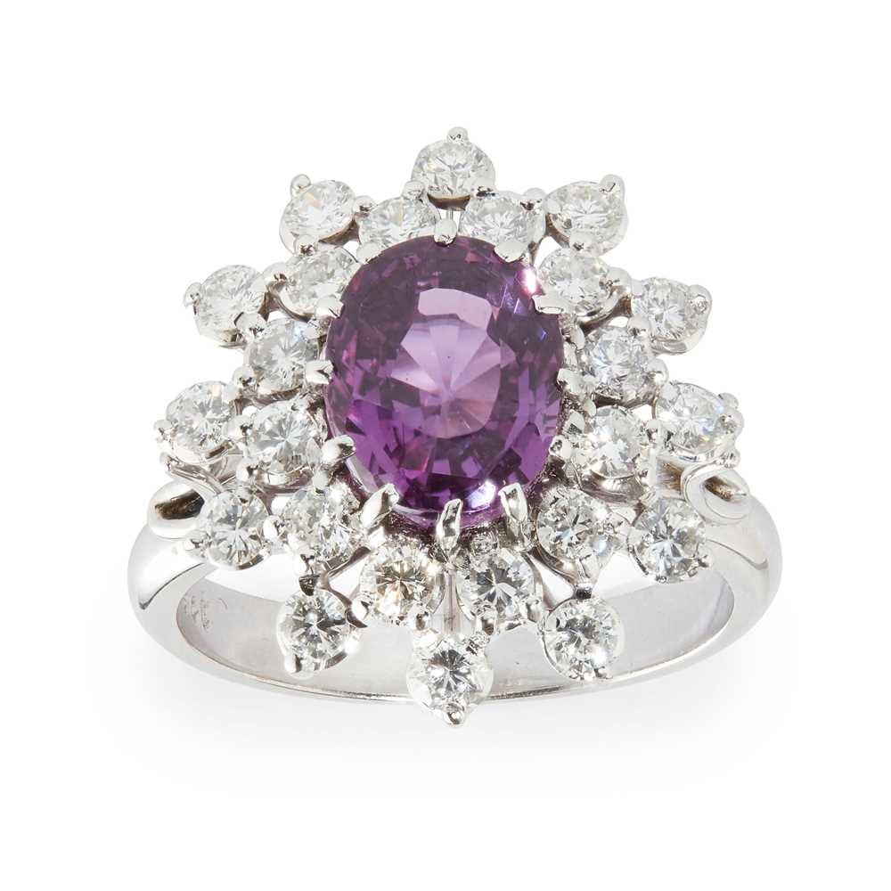 Lot 71 - A pink sapphire and diamond set cluster ring