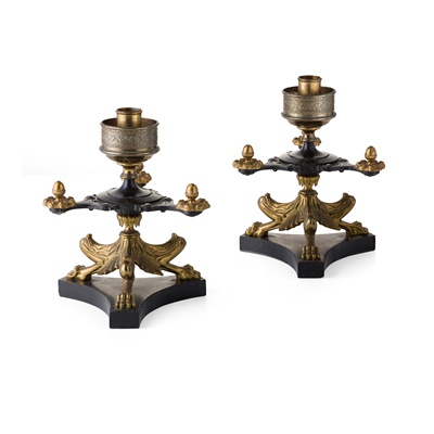 Lot 154 - PAIR OF REGENCY STYLE GILT AND PATINATED BRONZE CANDLESTICKS
