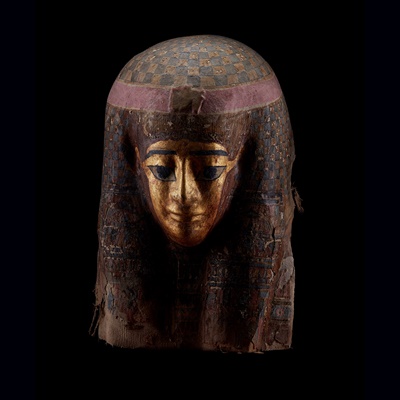 Lot 113 - AN ANCIENT EGYPTIAN PTOLEMAIC GILT CARTONNAGE MASK