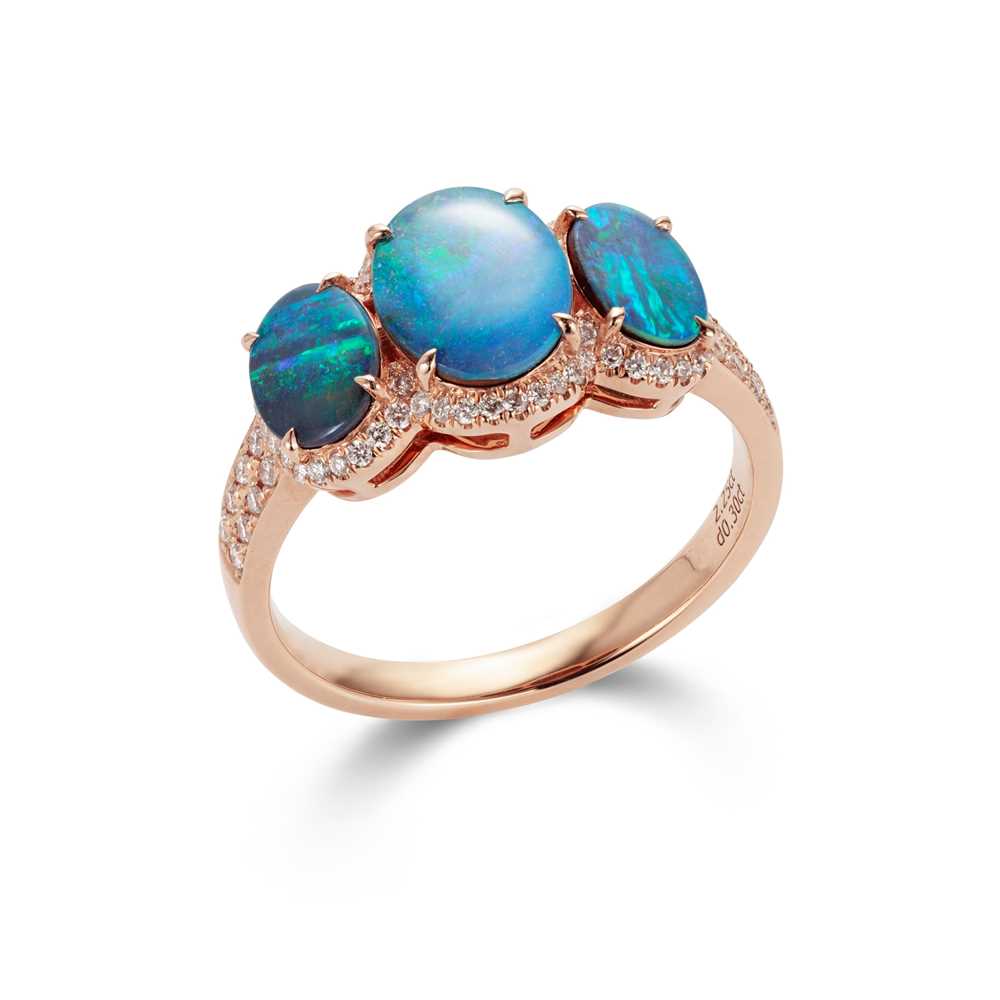 Lot 107 - An opal and diamond three-stone ring