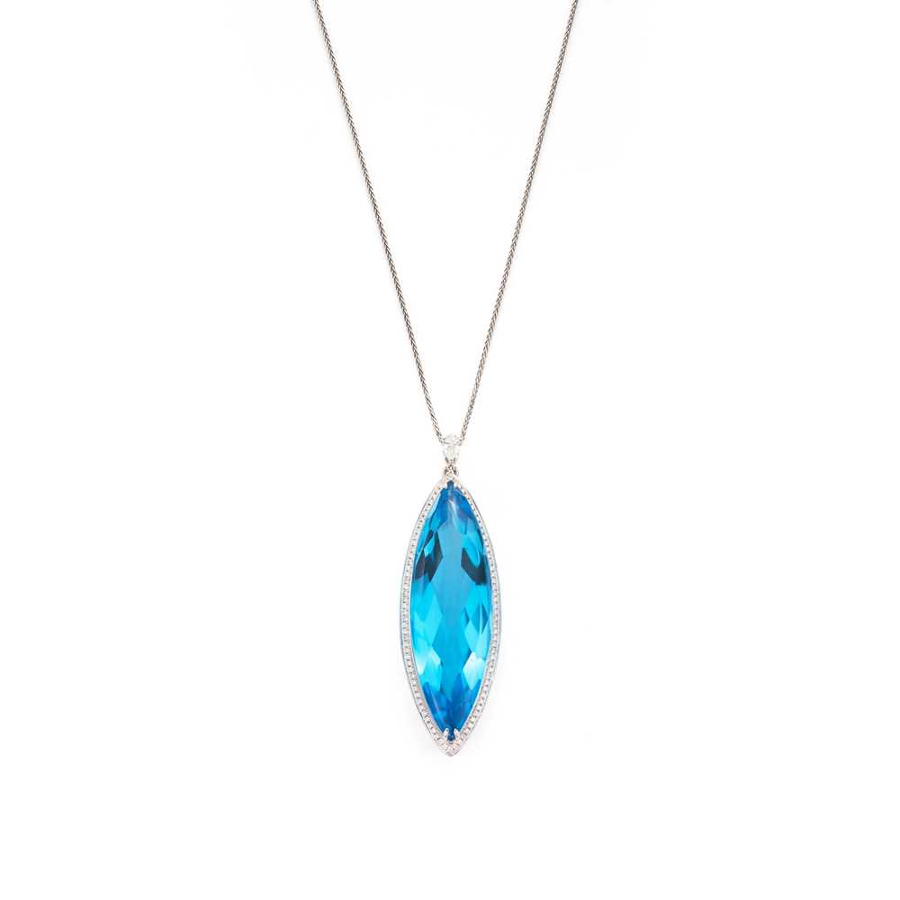 Lot 101 - A blue topaz and diamond pendant
