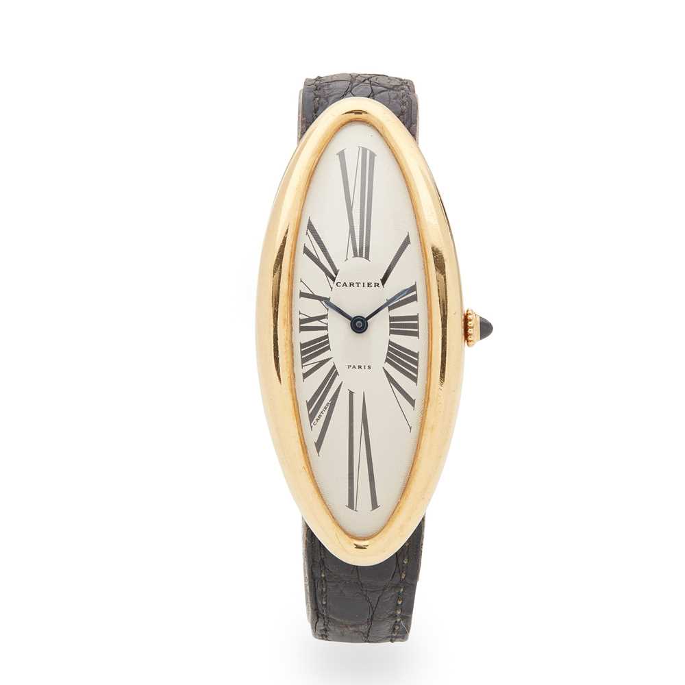 Lot 129 - Cartier: a gold wrist watch