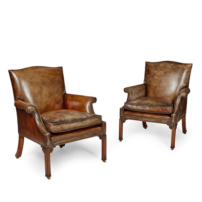 Lot 251 - PAIR OF GEORGE III STYLE LEATHER UPHOLSTERED LIBRARY ARMCHAIRS