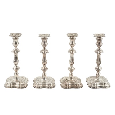 Lot 321 - A set of four late Victorian candlesticks