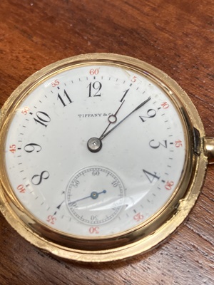 Lot 148 - Tiffany: A gold pocket watch