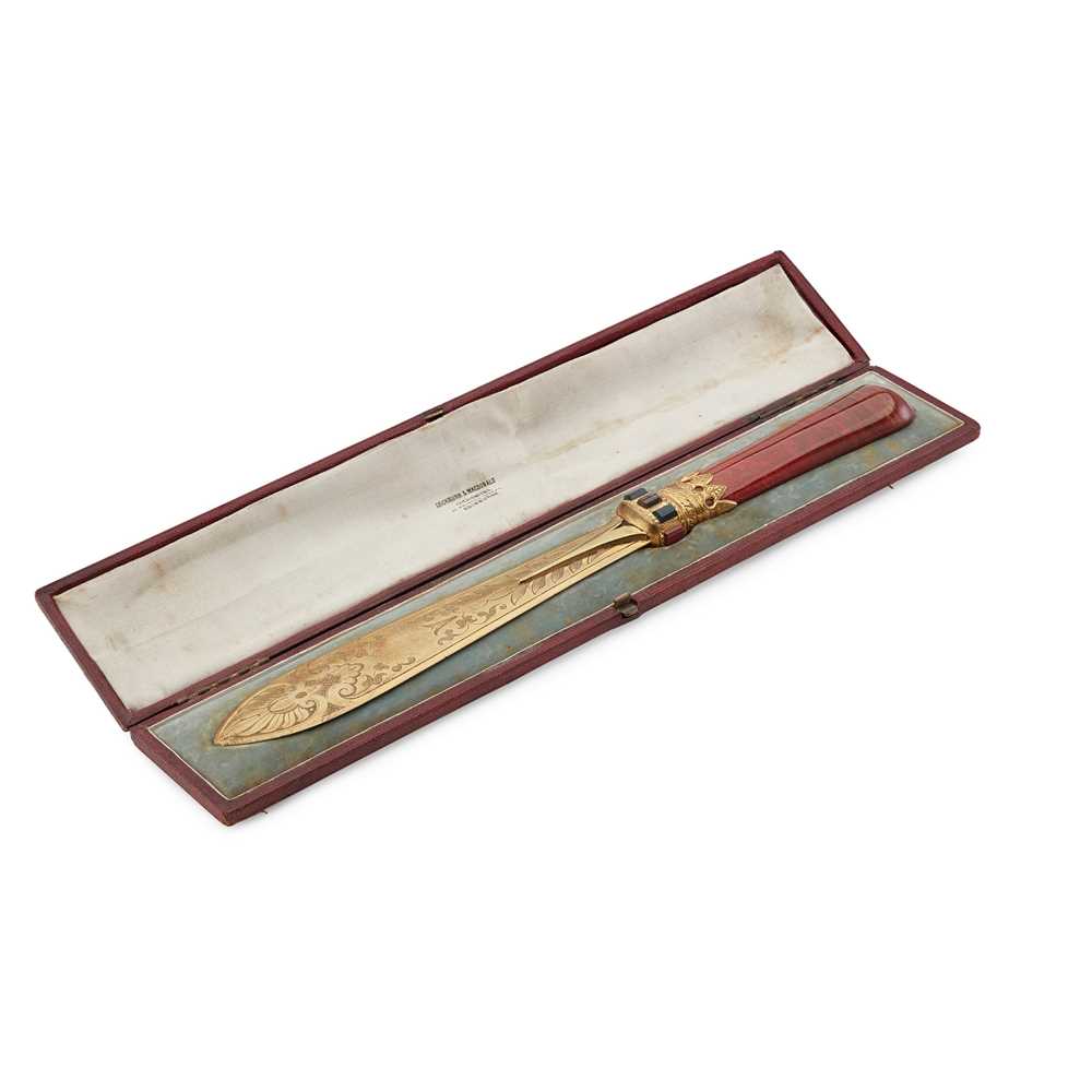 Lot 105 - A VICTORIAN CASED GILT PAPER KNIFE