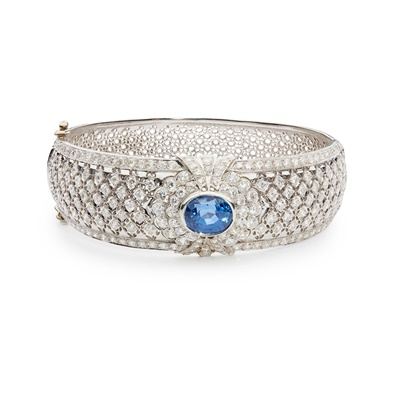 Lot 74 - A sapphire and diamond bangle