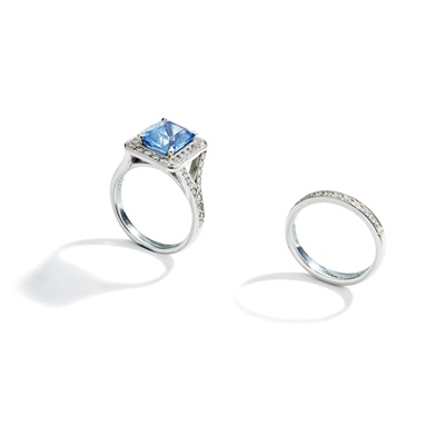 Lot 243 - A sapphire and diamond ring and diamond half-hoop ring