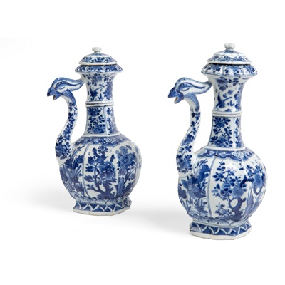 Lot 208 - PAIR OF BLUE AND WHITE PHOENIX-HEAD LIDDED EWERS