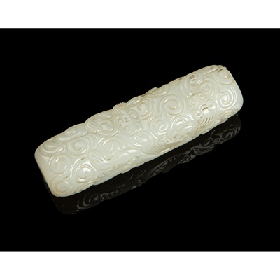 Lot 123 - WHITE JADE CARVING OF A 'DRAGON' ORNAMENT