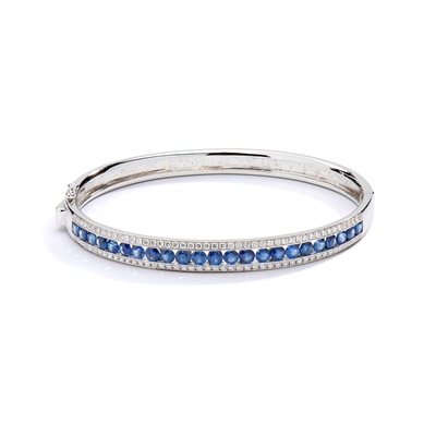 Lot 242 - A sapphire and diamond bangle, by Mappin & Webb