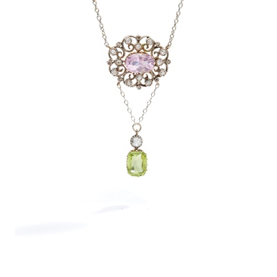 Lot 60 - An early 20th century pink sapphire, diamond and peridot pendant, circa 1910