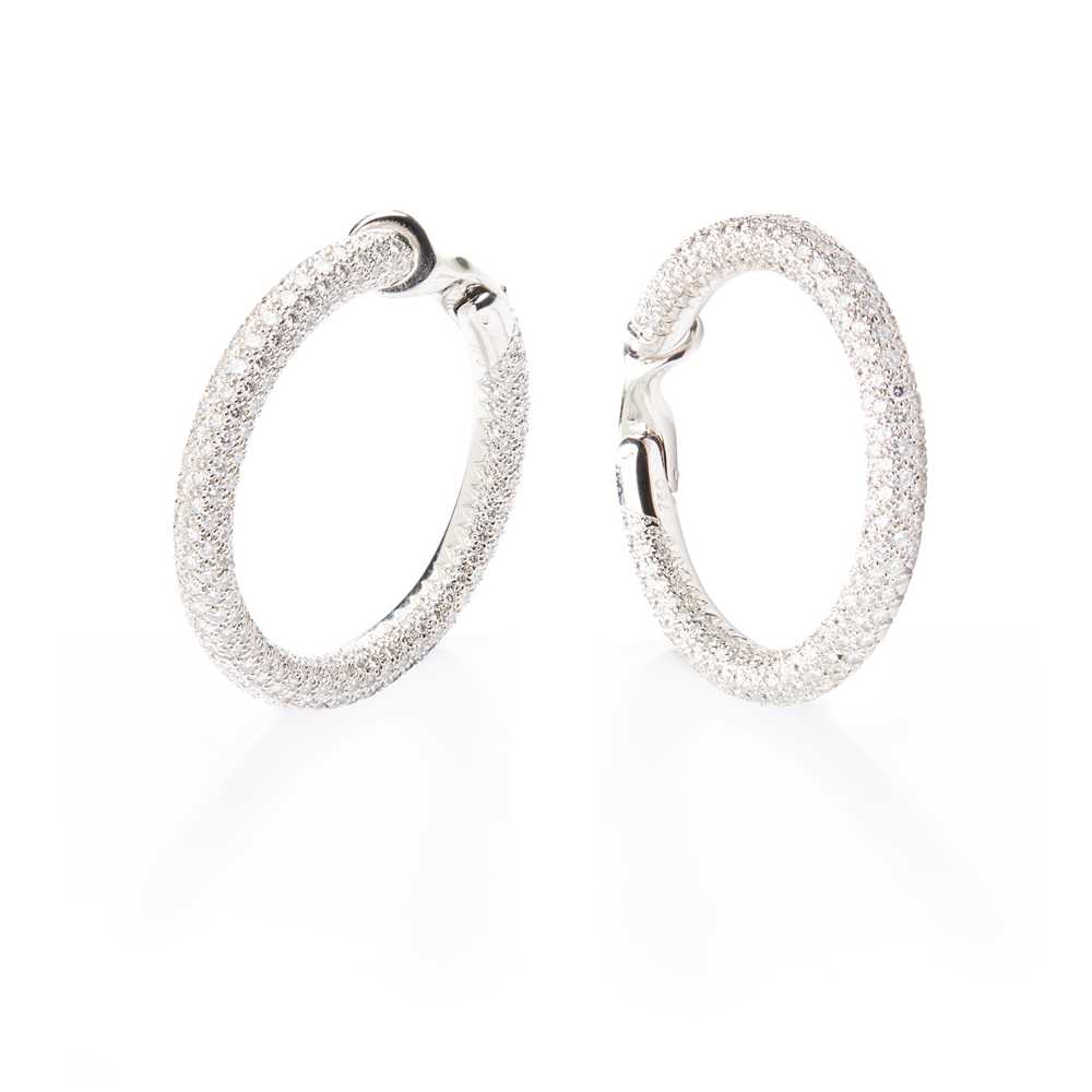 Lot 113 - A pair of diamond hoop earrings, by Chaumet