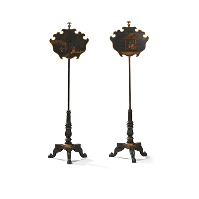 Lot 174 - PAIR OF REGENCY BLACK JAPANNED AND CAST IRON POLE SCREENS
