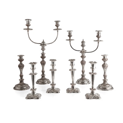 Lot 5 - A suite of four table plated candlesticks