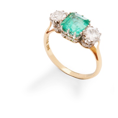 Lot 334 - A three-stone emerald and diamond ring