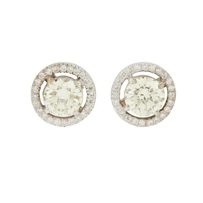Lot 233 - A pair of diamond cluster earrings