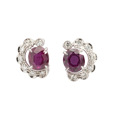 Lot 353 - A pair of ruby and diamond cluster ear studs