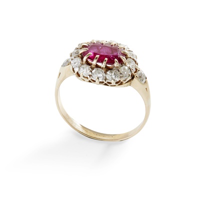 Lot 297 - A ruby and diamond cluster ring