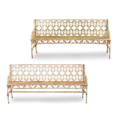 Lot 693 - PAIR OF FRENCH GOTHIC REVIVAL CAST-IRON GARDEN BENCHES, AFTER A DESIGN BY THE VAL D'OSNE FOUNDRY
