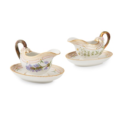 Lot 601 - TWO ROYAL COPENHAGEN 'FLORA DANICA' SAUCE BOATS ON FIXED STANDS