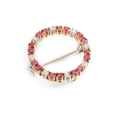 Lot 175 - A circular ruby and diamond brooch