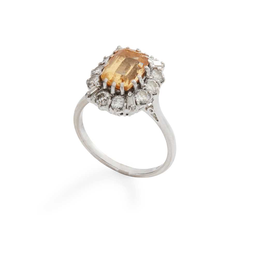 Lot 224 - A yellow topaz and diamond cluster ring