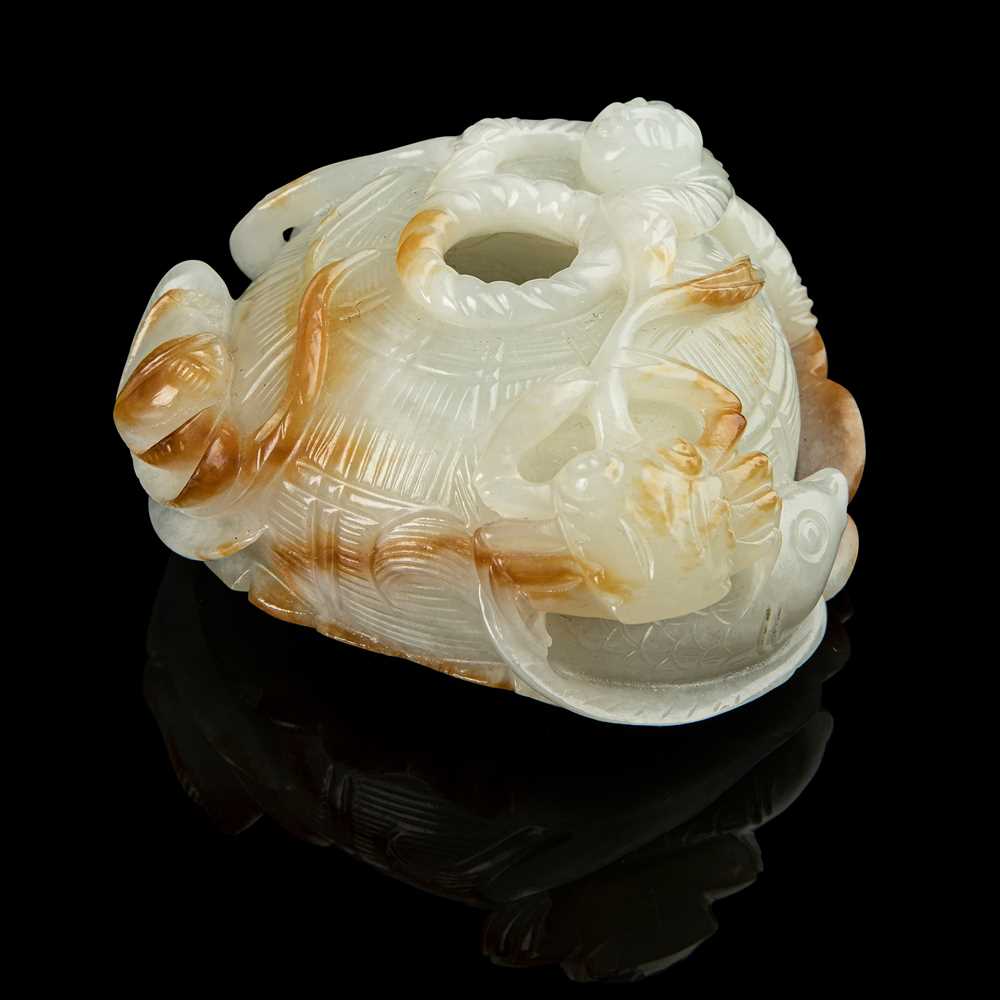 Lot 111 - WHITE JADE WITH RUSSET SKIN CARVING OF WATER POT