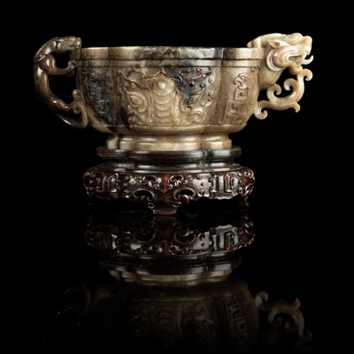 Lot 126 - WHITE AND RUSSET JADE 'TAOTIE' CUP WITH DRAGON AND CHILONG HANDLES