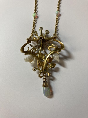 Lot 32 - An Art Nouveau enamel, opal and diamond pendant necklace, circa 1900